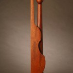 Bass Player - Mahogany Wood Sculpture by Santa Fe Sculptor Richard Knox